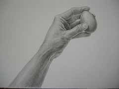 Re: 茶色い卵を持った手